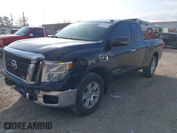 ✅ 2017 Nissan Titan S • VIN: 1N6AA1CJ1HN558737 • Lot: 41011323. Listed on IAAI with 56,249 mi. Free auction sales archive from the USA and detailed vehicle history report at DreamBid. Image 2.