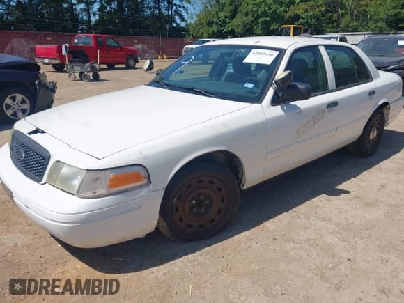 ✅ 2003 Ford Police Interceptor Street Appear • VIN: 2FAHP71W23X179762 • Lot: 42802650. Listed on IAAI with 107,635 mi. Free auction sales archive from the USA and detailed vehicle history report at DreamBid. Image 2.