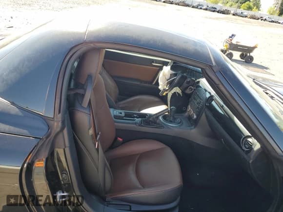 ✅ 2013 Mazda MX-5 Miata Grand Touring • VIN: JM1NC2PFXD0227978 • Лот: 63883604. Опубликован ранее на Copart с пробегом 31 905 миль. Бесплатный доступ к архиву аукционных продаж из США и подробный отчёт об истории автомобиля на DreamBid. Изображение 10.