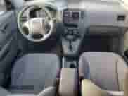 2006 Hyundai Tucson GL with VIN KM8JM12B86U411849, listed as a Copart auction lot 69301264 with 125,056 mi miles and Salvage title. Bid and sale history available at DreamBid. Image 8.