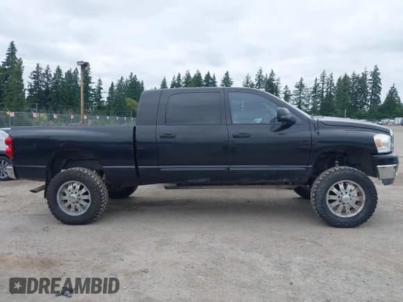 ✅ 2007 Dodge 1500 Laramie • VIN: 3D7KS19D97G746117 • Lot: 42509554. Wystawiony na IAAI z przebiegiem 121 548 mil. Bezpłatny archiwum sprzedaży aukcyjnych z USA i szczegółowy raport historii pojazdu na DreamBid. Zdjęcie 13.