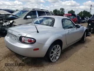✅ 2007 Mazda MX-5 Miata Grand Touring • VIN: JM1NC26F370137271 • Лот: 66772934. Опубликован ранее на Copart с пробегом 49 152 миль. Бесплатный доступ к архиву аукционных продаж из США и подробный отчёт об истории автомобиля на DreamBid. Изображение 3.