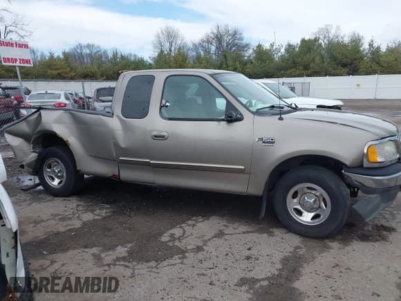 ✅ 2003 Ford F-150 XL • VIN: 2FTRX17L13CA34390 • Лот: 41869497. Опубликован ранее на IAAI с пробегом 114 221 миль. Бесплатный доступ к архиву аукционных продаж из США и подробный отчёт об истории автомобиля на DreamBid. Изображение 14.