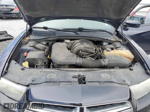 2012 Dodge Charger SXT Plus с VIN 2C3CDXJGXCH161644, выставлен на аукционе Copart как лот 69469145 с пробегом 181 013 миль миль и Списание • Salvage title. История ставок и продаж доступна на DreamBid. Изображение 11.