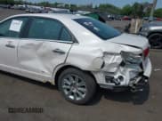 ✅ 2012 Lincoln MKZ • VIN: 3LNHL2JC4CR828535 • Lot: 42418321. Listed on IAAI with 124,470 mi. Free auction sales archive from the USA and detailed vehicle history report at DreamBid. Image 6.