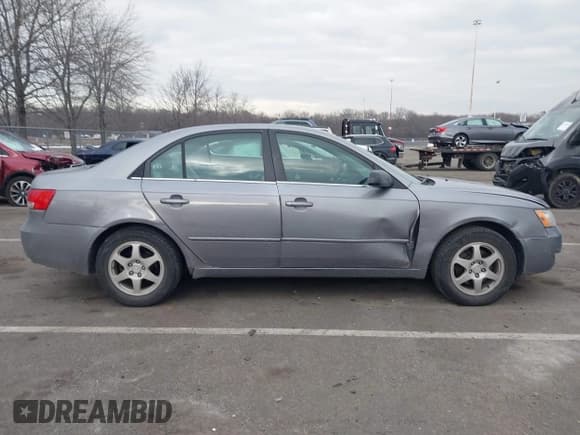 ✅ 2006 Hyundai Sonata GLS • VIN: 5NPEU46F96H115561 • Лот: 41327577. Опубликован ранее на IAAI с пробегом 105 870 миль. Бесплатный доступ к архиву аукционных продаж из США и подробный отчёт об истории автомобиля на DreamBid. Изображение 13.