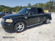 ✅ 2003 Ford F-150 Harley-Davidson • VIN: 1FTRW07383KD62463 • Lot: 49995655. Listed on Copart with 131,683 mi. Free auction sales archive from the USA and detailed vehicle history report at DreamBid. Image 1.