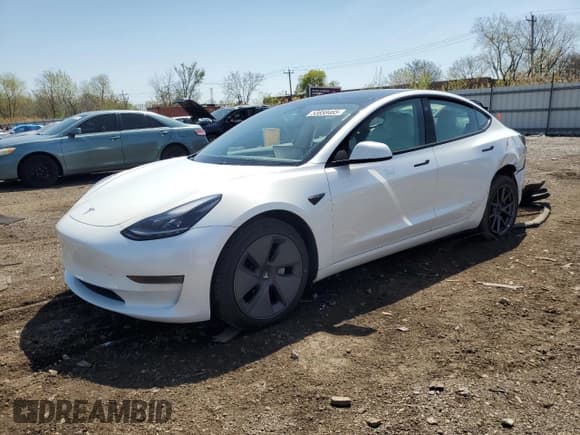 ✅ 2021 Tesla Model 3 Standard Range Plus • VIN: 5YJ3E1EAXMF977983 • Лот: 53858465. Опубликован ранее на Copart с пробегом 28 279 миль. Бесплатный доступ к архиву аукционных продаж из США и подробный отчёт об истории автомобиля на DreamBid. Изображение 1.