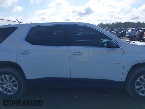 ✅ 2020 Chevrolet Traverse LS • VIN: 1GNERFKW3LJ272502 • Lot: 42926810. Listed on IAAI with 95,359 mi. Free auction sales archive from the USA and detailed vehicle history report at DreamBid. Image 14.