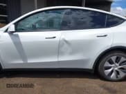 ✅ 2023 Tesla Model Y Long Range • VIN: 7SAYGDEE1PF752864 • Lot: 43156315. Wystawiony na IAAI z przebiegiem 30 553 mil. Bezpłatny archiwum sprzedaży aukcyjnych z USA i szczegółowy raport historii pojazdu na DreamBid. Zdjęcie 6.