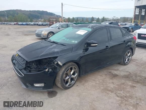 ✅ 2016 Ford Focus SE • VIN: 1FADP3FE1GL248774 • Lot: 43297491. Listed on IAAI with 101,346 mi. Free auction sales archive from the USA and detailed vehicle history report at DreamBid. Image 18.