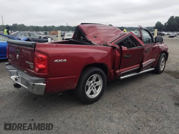 2010 Dodge Dakota Laramie z VIN 1D7CW5GP3AS156914, wystawiony jako IAAI lot #42569804 z przebiegiem 198 463 mil mil oraz . Historia ofert i sprzedaży dostępna na DreamBid. Obrazek 4.