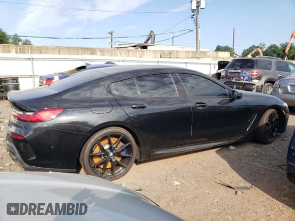 ✅ 2022 BMW 8 Series M850i • VIN: WBAGV8C01NCH65668 • Lot: 61305903. Listed on Copart with Not provided. Free auction sales archive from the USA and detailed vehicle history report at DreamBid. Image 3.