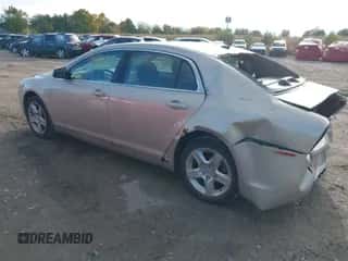 2011 Chevrolet Malibu 1LS with VIN 1G1ZB5E12BF167825, listed as a IAAI auction lot 43434145 with 130,457 mi miles and . Bid and sale history available at DreamBid. Image 3.