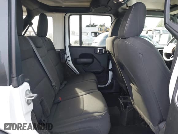 ✅ 2023 Jeep Wrangler Sport • VIN: 1C4HJXDG4PW567027 • Lot: 41633197. Wystawiony na IAAI z przebiegiem 14 782 mil. Bezpłatny archiwum sprzedaży aukcyjnych z USA i szczegółowy raport historii pojazdu na DreamBid. Zdjęcie 8.