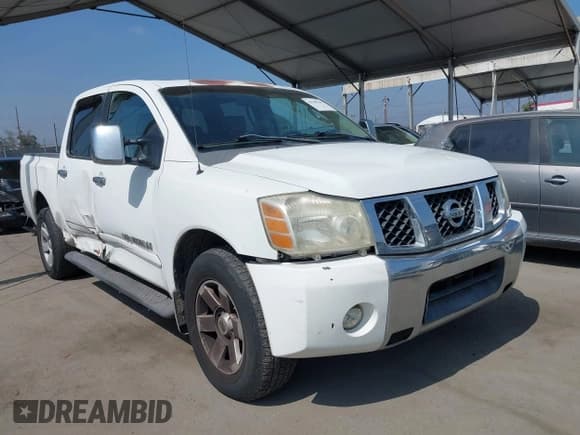 ✅ 2005 Nissan Titan LE • VIN: 1N6AA07BX5N573584 • Lot: 42709369. Listed on IAAI with 221,492 mi. Free auction sales archive from the USA and detailed vehicle history report at DreamBid. Image 1.