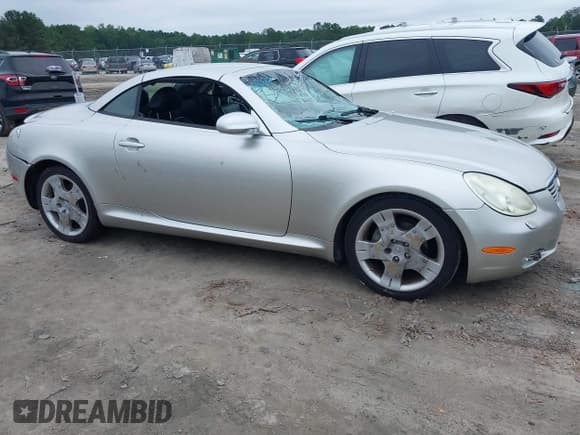 ✅ 2004 Lexus SC 430 • VIN: JTHFN48Y140058295 • Lot: 42883490. Listed on IAAI with 121,555 mi. Free auction sales archive from the USA and detailed vehicle history report at DreamBid. Image 13.