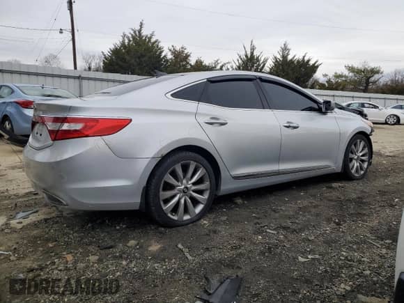 2012 Hyundai Azera with VIN KMHFH4JG3CA192580, listed as a Copart auction lot 82609194 with 127,887 mi miles and Salvage title. Bid and sale history available at DreamBid. Image 3.