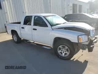 2005 Dodge Dakota SLT с VIN 1D7HE48K85S237791, выставлен на аукционе Copart как лот 73787444 с пробегом 154 958 миль миль и Списание • Salvage title. История ставок и продаж доступна на DreamBid. Изображение 4.
