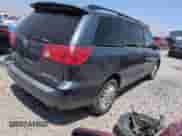 2009 Toyota Sienna LE with VIN 5TDBK23C09S023602, listed as a Copart auction lot 65241605 with 214,661 mi miles and Clean title. Bid and sale history available at DreamBid. Image 3.