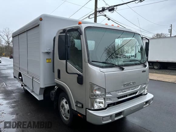 ✅ 2019 Isuzu NRR IBT • VIN: JALE5W167K7301631 • Lot: 52779745. Listed on Copart with 100,482 mi. Free auction sales archive from the USA and detailed vehicle history report at DreamBid. Image 1.