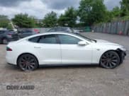 ✅ 2015 Tesla Model S 85D • VIN: 5YJSA1H41FF082379 • Lot: 42321001. Listed on IAAI with 109,465 mi. Free auction sales archive from the USA and detailed vehicle history report at DreamBid. Image 14.