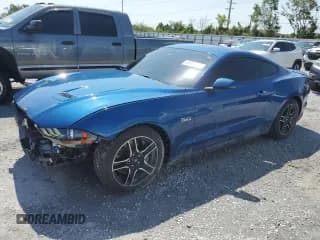 ✅ 2022 Ford Mustang GT • VIN: 1FA6P8CFXN5143025 • Lot: 66652425. Listed on Copart with 15,615 mi. Free auction sales archive from the USA and detailed vehicle history report at DreamBid. Image 1.