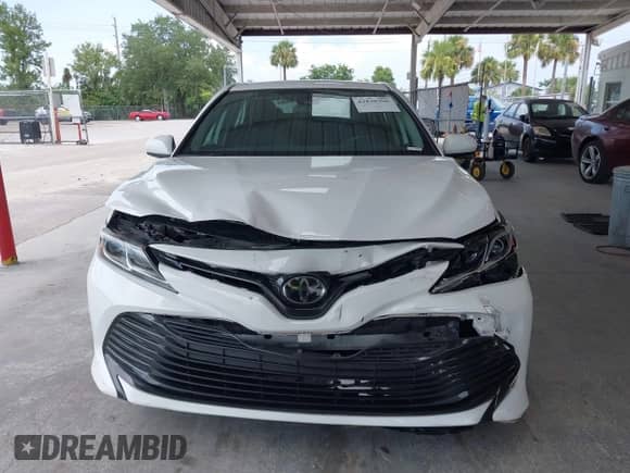 2019 Toyota Camry LE with VIN 4T1B11HK3KU709546, listed as a IAAI auction lot 42836396 with 113,611 mi miles and . Bid and sale history available at DreamBid. Image 12.