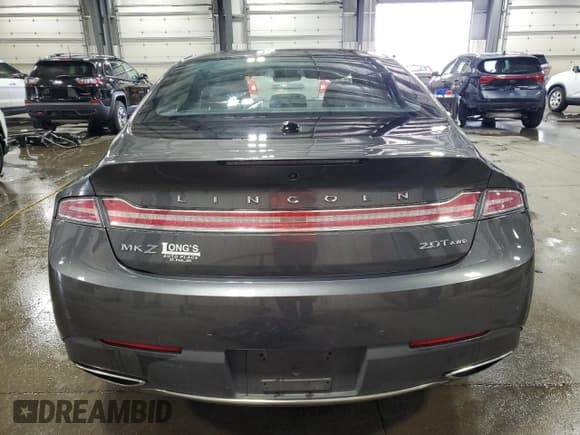 ✅ 2017 Lincoln MKZ Select • VIN: 3LN6L5D96HR624741 • Lot: 64947545. Wystawiony na Copart z przebiegiem 131 469 mil. Bezpłatny archiwum sprzedaży aukcyjnych z USA i szczegółowy raport historii pojazdu na DreamBid. Zdjęcie 6.