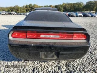 ✅ 2014 Dodge Challenger SXT • VIN: 2C3CDYAG9EH302356 • Lot: 77893344. Wystawiony na Copart z przebiegiem 155 123 mil. Bezpłatny archiwum sprzedaży aukcyjnych z USA i szczegółowy raport historii pojazdu na DreamBid. Zdjęcie 6.