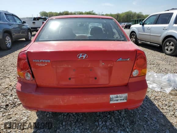 2005 Hyundai Accent GLS z VIN KMHCG45C15U592443, wystawiony jako Copart lot #52291025 z przebiegiem 142 263 mil mil oraz Szkoda całkowita • Salvage title. Historia ofert i sprzedaży dostępna na DreamBid. Obrazek 6.