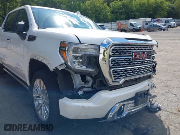 ✅ 2021 GMC Sierra 1500 Denali • VIN: 3GTU9FEL0MG255150 • Lot: 43060209. Wystawiony na IAAI z przebiegiem 56 711 mil. Bezpłatny archiwum sprzedaży aukcyjnych z USA i szczegółowy raport historii pojazdu na DreamBid. Zdjęcie 22.