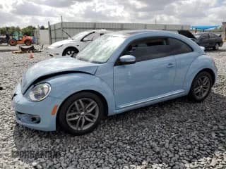 ✅ 2013 Volkswagen Beetle Fender Edition • VIN: 3VWJP7AT4DM609125 • Lot: 55358305. Listed on Copart with 85,911 mi. Free auction sales archive from the USA and detailed vehicle history report at DreamBid. Image 1.