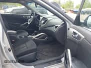 ✅ 2014 Hyundai Veloster • VIN: KMHTC6AD8EU182891 • Lot: 42363105. Wystawiony na IAAI z przebiegiem 182 073 mil. Bezpłatny archiwum sprzedaży aukcyjnych z USA i szczegółowy raport historii pojazdu na DreamBid. Zdjęcie 5.