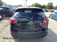 ✅ 2016 Mazda CX-5 Touring • VIN: JM3KE2CY7G0849891 • Lot: 43288504. Listed on IAAI with 133,906 mi. Free auction sales archive from the USA and detailed vehicle history report at DreamBid. Image 16.