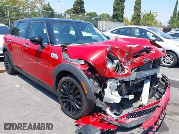 ✅ 2018 MINI Clubman Cooper S • VIN: WMWLN9C50J2E51302 • Lot: 42910452. Listed on IAAI with 33,773 mi. Free auction sales archive from the USA and detailed vehicle history report at DreamBid. Image 1.