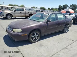 ✅ 1999 Chevrolet Malibu • VIN: 1G1ND52TXX6256919 • Lot: 64063815. Listed on Copart with 161,583 mi. Free auction sales archive from the USA and detailed vehicle history report at DreamBid. Image 1.