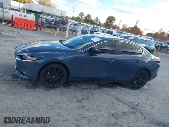✅ 2024 Mazda 3 S Carbon Edition • VIN: 3MZBPBCM9RM421270 • Lot: 43604481. Listed on IAAI with 23,354 mi. Free auction sales archive from the USA and detailed vehicle history report at DreamBid. Image 14.