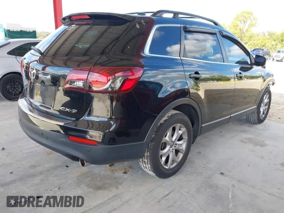 ✅ 2015 Mazda CX-9 Touring • VIN: JM3TB2CA4F0458826 • Lot: 43729062. Wystawiony na IAAI z przebiegiem 112 106 mil. Bezpłatny archiwum sprzedaży aukcyjnych z USA i szczegółowy raport historii pojazdu na DreamBid. Zdjęcie 4.