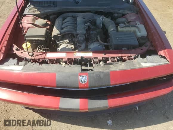 2010 Dodge Challenger SE z VIN 2B3CJ4DV0AH270190, wystawiony jako Copart lot #72427274 z przebiegiem 214 631 mil mil oraz Szkoda całkowita • Salvage title. Historia ofert i sprzedaży dostępna na DreamBid. Obrazek 11.