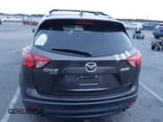 ✅ 2016 Mazda CX-5 Touring • VIN: JM3KE4CY5G0845575 • Lot: 43653030. Listed on IAAI with 79,795 mi. Free auction sales archive from the USA and detailed vehicle history report at DreamBid. Image 16.