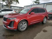 ✅ 2024 Cadillac XT6 FWD Premium Luxury • VIN: 1GYKPCRS1RZ700168 • Lot: 59327055. Listed on Copart with 21,001 mi. Free auction sales archive from the USA and detailed vehicle history report at DreamBid. Image 1.