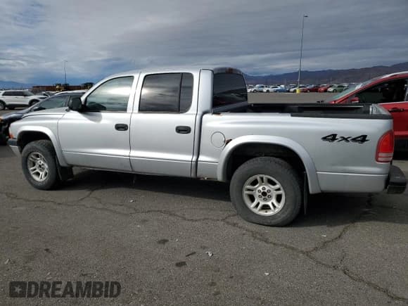 ✅ 2003 Dodge Dakota Sport • VIN: 1D7HG38N23S205026 • Lot: 82214314. Wystawiony na Copart z przebiegiem 194 724 mil. Bezpłatny archiwum sprzedaży aukcyjnych z USA i szczegółowy raport historii pojazdu na DreamBid. Zdjęcie 2.