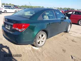 2015 Chevrolet Cruze LT z VIN 1G1PE5SB7F7283596, wystawiony jako IAAI lot #43289256 z przebiegiem 134 060 mil mil oraz . Historia ofert i sprzedaży dostępna na DreamBid. Obrazek 4.