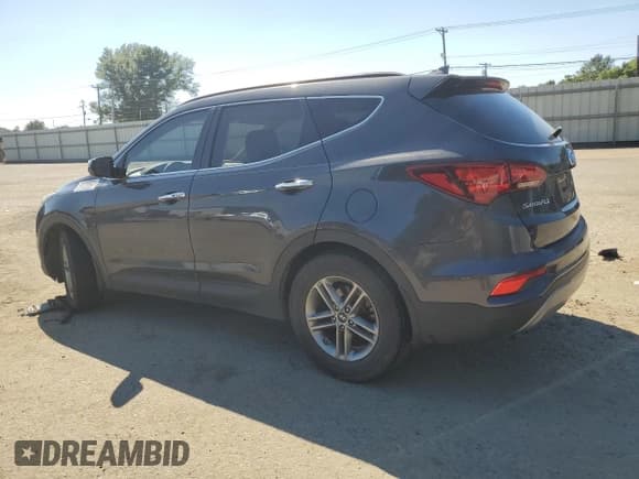 ✅ 2018 Hyundai Santa Fe 2.4L • VIN: 5XYZU3LB6JG522640 • Лот: 59038864. Опубликован ранее на Copart с пробегом 82 372 миль. Бесплатный доступ к архиву аукционных продаж из США и подробный отчёт об истории автомобиля на DreamBid. Изображение 2.