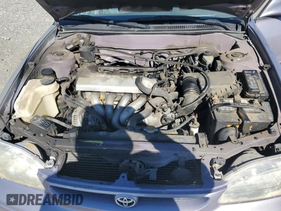 ✅ 1998 Toyota Corolla LE • VIN: 1NXBR18E5WZ099366 • Лот: 87099535. Опубликован ранее на Copart с пробегом 173 725 миль. Бесплатный доступ к архиву аукционных продаж из США и подробный отчёт об истории автомобиля на DreamBid. Изображение 11.