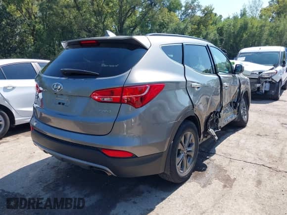 2014 Hyundai Santa Fe with VIN 5XYZU3LB8EG193235, listed as a IAAI auction lot 43285823 with 84,842 mi miles and . Bid and sale history available at DreamBid. Image 4.