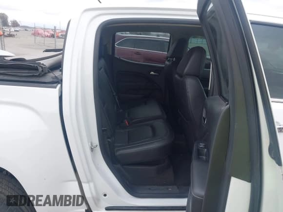 ✅ 2017 GMC Canyon 4WD SLT • VIN: 1GTG6DEN6H1249790 • Лот: 43609704. Опубликован ранее на IAAI с пробегом 141 693 миль. Бесплатный доступ к архиву аукционных продаж из США и подробный отчёт об истории автомобиля на DreamBid. Изображение 8.