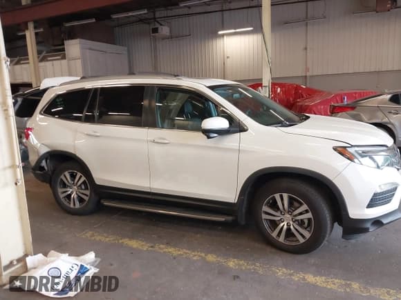 ✅ 2018 Honda Pilot EX-L • VIN: 5FNYF5H57JB031523 • Лот: 43169866. Опубликован ранее на IAAI с пробегом 109 412 миль. Бесплатный доступ к архиву аукционных продаж из США и подробный отчёт об истории автомобиля на DreamBid. Изображение 13.