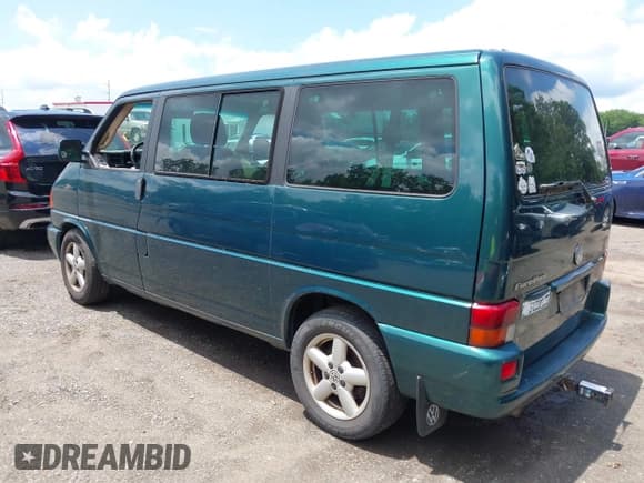 ✅ 2002 Volkswagen EuroVan GLS • VIN: WV2KB47032H090623 • Lot: 42750101. Listed on IAAI with 237,862 mi. Free auction sales archive from the USA and detailed vehicle history report at DreamBid. Image 3.